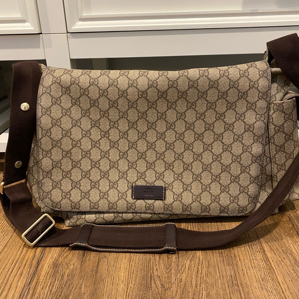 COPY - Gucci diaper bag good condition with changing pad.